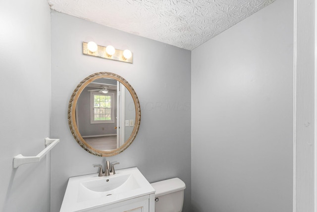6541 Skywae Dr, Columbus, OH 43229 - bathroom with toilet, a textured ceiling, and vanity
