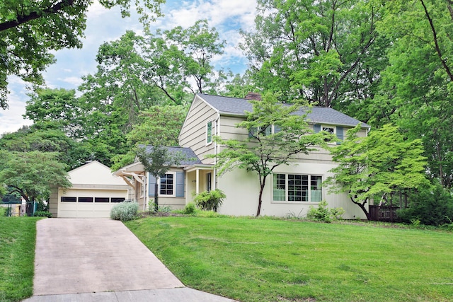 4399 Colerain Ave, Columbus, OH 43214 - view of front facade with concrete driveway, an attached garage, and a shingled roof