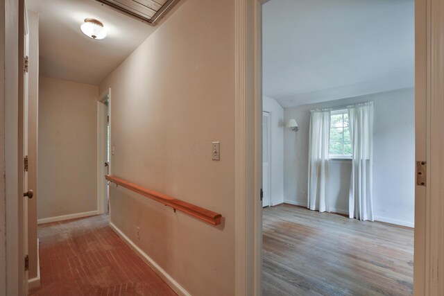 4399 Colerain Ave, Columbus, OH 43214 - hall with an upstairs landing, baseboards, and wood finished floors