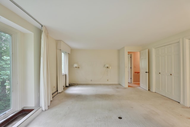 4399 Colerain Ave, Columbus, OH 43214 - unfurnished living room with light colored carpet