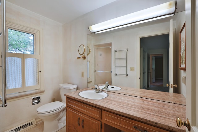 4399 Colerain Ave, Columbus, OH 43214 - bathroom with toilet, vanity, a shower with shower door, and tile patterned flooring