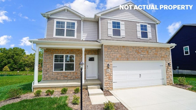1486 Chrisman Dr, Columbus, OH 43223 - view of front of home featuring stone siding, covered porch, an attached garage, driveway, and a front yard