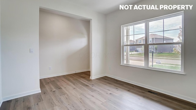 1486 Chrisman Dr, Columbus, OH 43223 - unfurnished room featuring wood finished floors and baseboards