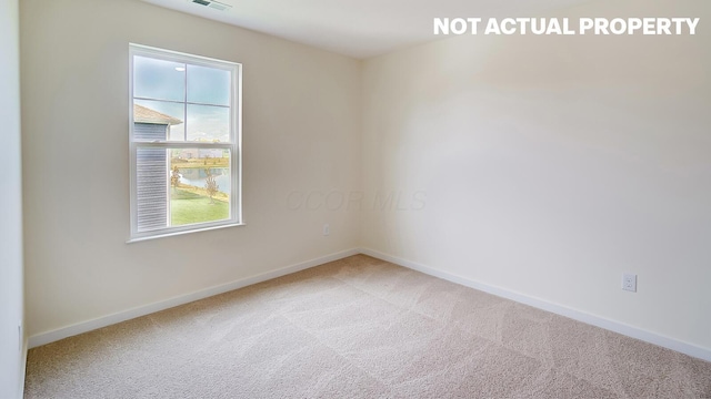 1486 Chrisman Dr, Columbus, OH 43223 - carpeted empty room with baseboards