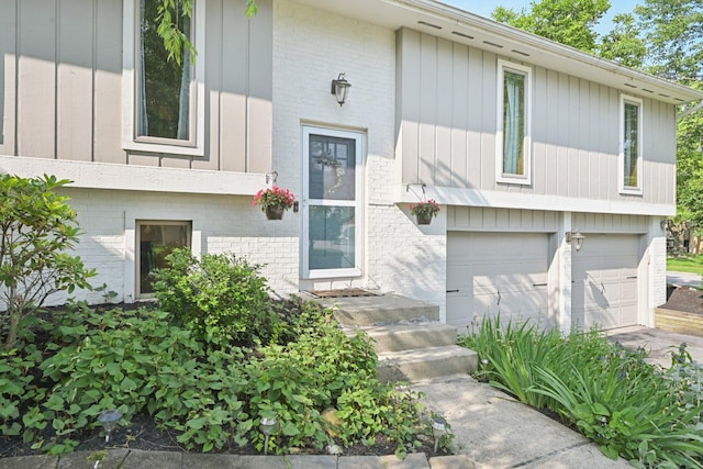 4561 Valley Quail Blvd N, Westerville, OH 43081 - property entrance with brick siding and a garage