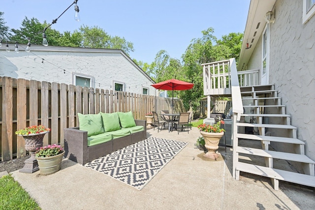 4561 Valley Quail Blvd N, Westerville, OH 43081 - fenced backyard with an outdoor living space, stairway, a patio area, and outdoor dining space