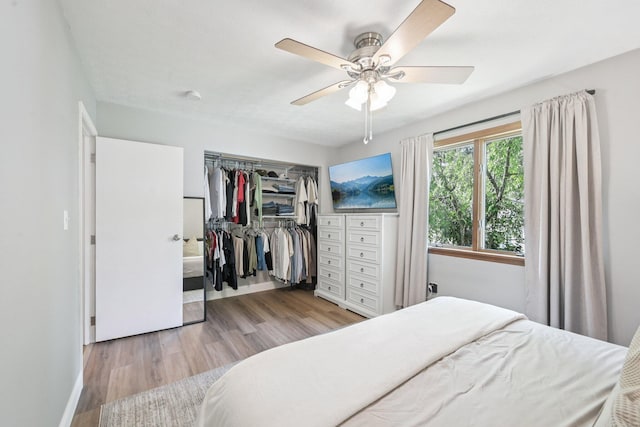 4561 Valley Quail Blvd N, Westerville, OH 43081 - bedroom featuring light wood finished floors, a closet, baseboards, and ceiling fan