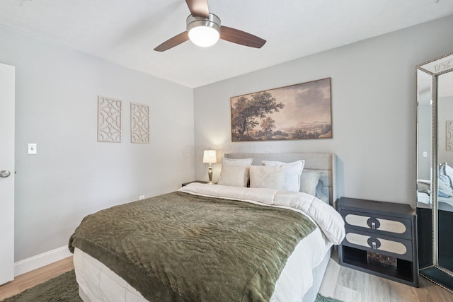 4561 Valley Quail Blvd N, Westerville, OH 43081 - bedroom featuring wood finished floors, a ceiling fan, and baseboards