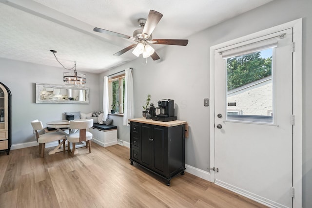 4561 Valley Quail Blvd N, Westerville, OH 43081 - dining area featuring light wood finished floors, a ceiling fan, and baseboards