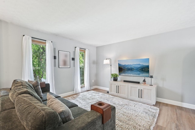 4561 Valley Quail Blvd N, Westerville, OH 43081 - living area with light wood-style flooring and baseboards