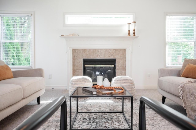 1808 Primrose Ave, Lewis Center, OH 43035 - carpeted living room featuring a high end fireplace, baseboards, and plenty of natural light
