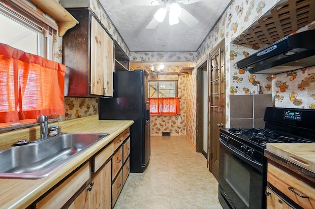 443 Binns Blvd, Columbus, OH 43204 - kitchen featuring wallpapered walls, black appliances, a sink, range hood, and ceiling fan