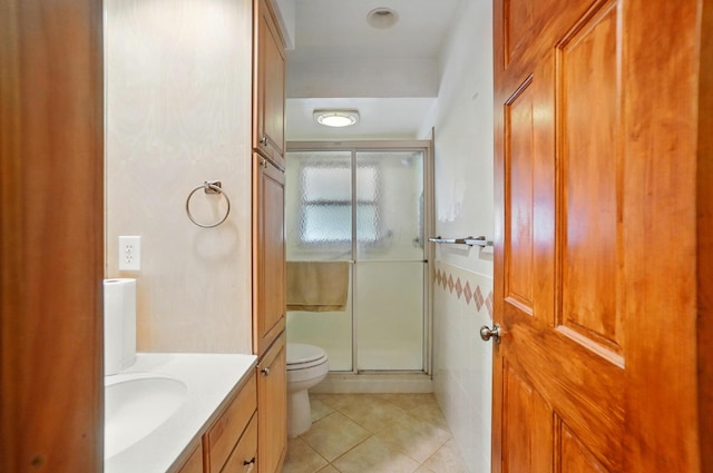 443 Binns Blvd, Columbus, OH 43204 - full bathroom with toilet, tile patterned flooring, a shower stall, and vanity