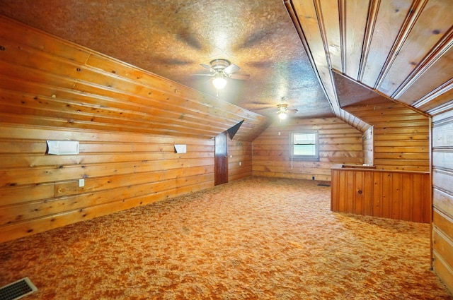 443 Binns Blvd, Columbus, OH 43204 - bonus room featuring ceiling fan, wood walls, carpet floors, and lofted ceiling