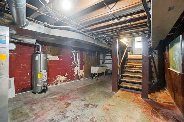 443 Binns Blvd, Columbus, OH 43204 - basement featuring water heater, stairway, and a sink