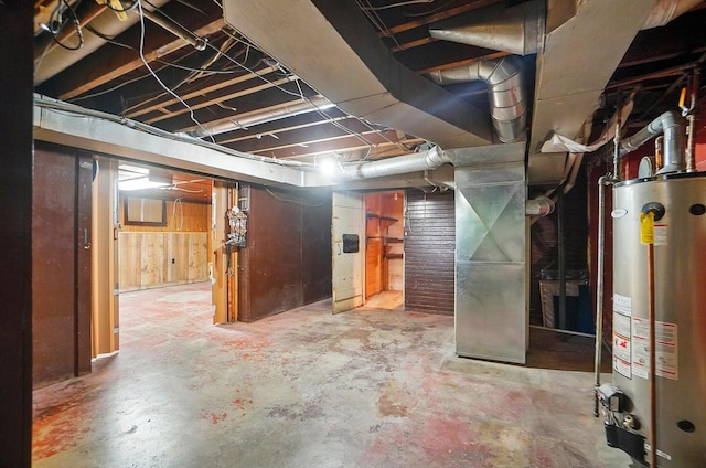 443 Binns Blvd, Columbus, OH 43204 - unfinished basement featuring water heater and wooden walls