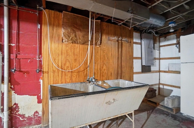 443 Binns Blvd, Columbus, OH 43204 - unfinished basement with electric panel and freestanding refrigerator