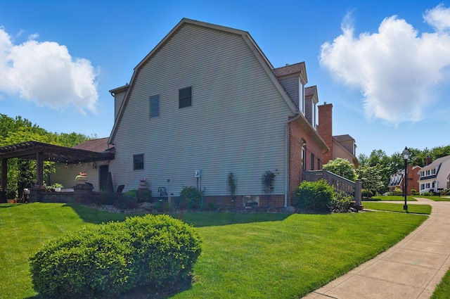 791 York St W, Mansfield, OH 44904 - view of property exterior with a pergola and a yard