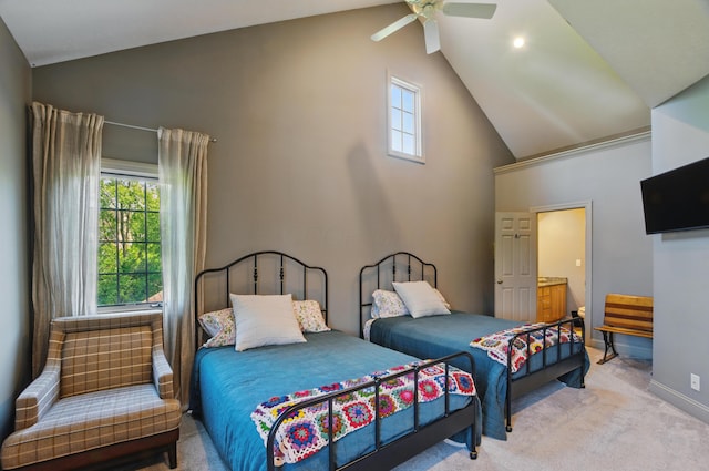 791 York St W, Mansfield, OH 44904 - carpeted bedroom with high vaulted ceiling, multiple windows, baseboards, a ceiling fan, and ensuite bath