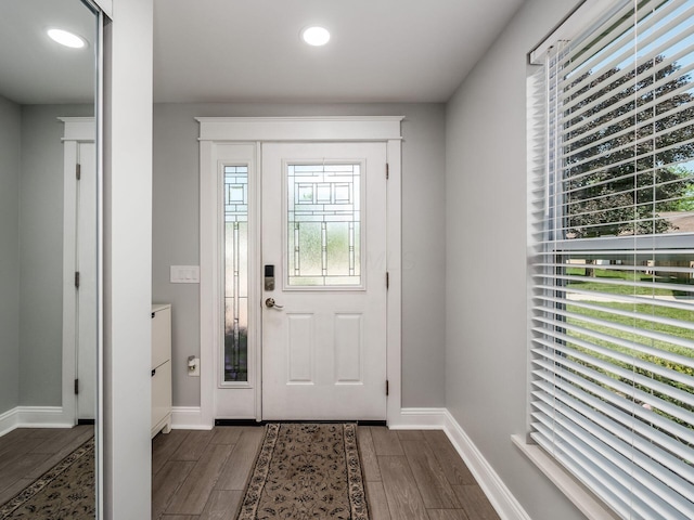 2073 Jeffey Dr, Hilliard, OH 43026 - foyer with healthy amount of natural light, dark wood-style flooring, recessed lighting, and baseboards