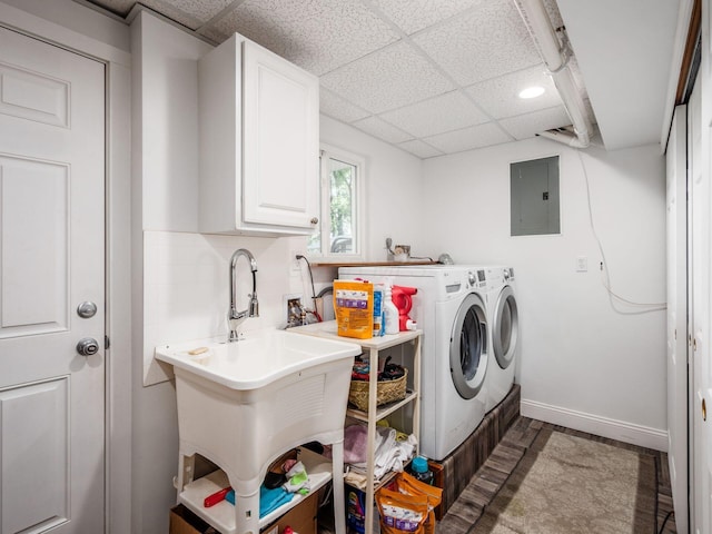 2073 Jeffey Dr, Hilliard, OH 43026 - laundry area featuring cabinet space, electric panel, independent washer and dryer, and baseboards