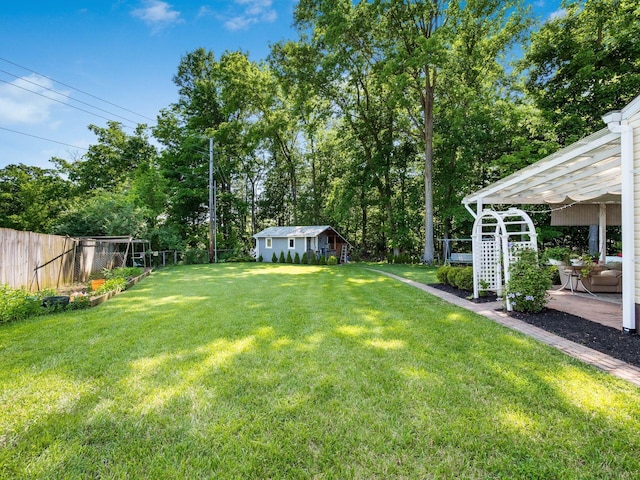 2073 Jeffey Dr, Hilliard, OH 43026 - view of yard featuring a pergola and an outbuilding