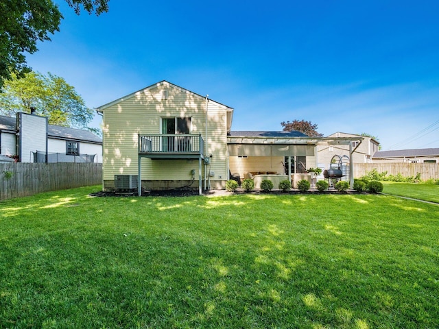 2073 Jeffey Dr, Hilliard, OH 43026 - back of house with solar panels and central air condition unit