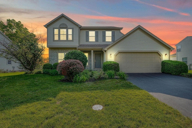 1300 Sotherby Xing, Lewis Center, OH 43035 - traditional-style home with asphalt driveway, an attached garage, and a front lawn