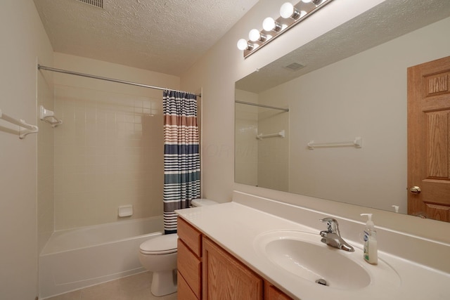 1300 Sotherby Xing, Lewis Center, OH 43035 - bathroom with toilet, vanity, shower / bath combo, a textured ceiling, and tile patterned flooring