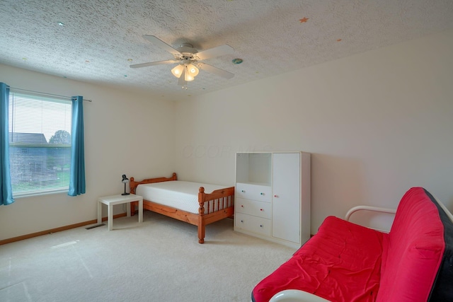 1300 Sotherby Xing, Lewis Center, OH 43035 - carpeted bedroom featuring a textured ceiling, a ceiling fan, and baseboards