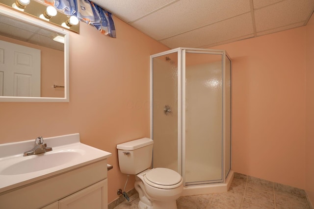 1300 Sotherby Xing, Lewis Center, OH 43035 - bathroom featuring a drop ceiling, a shower stall, vanity, toilet, and tile patterned flooring