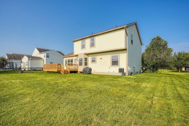 1300 Sotherby Xing, Lewis Center, OH 43035 - rear view of house with a wooden deck, a yard, and central AC unit