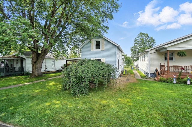1106 E Walnut St, Lancaster, OH 43130 - view of grassy yard featuring a wooden deck