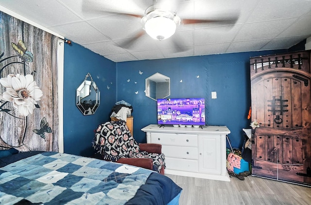 1106 E Walnut St, Lancaster, OH 43130 - bedroom featuring wood finished floors, a paneled ceiling, and ceiling fan