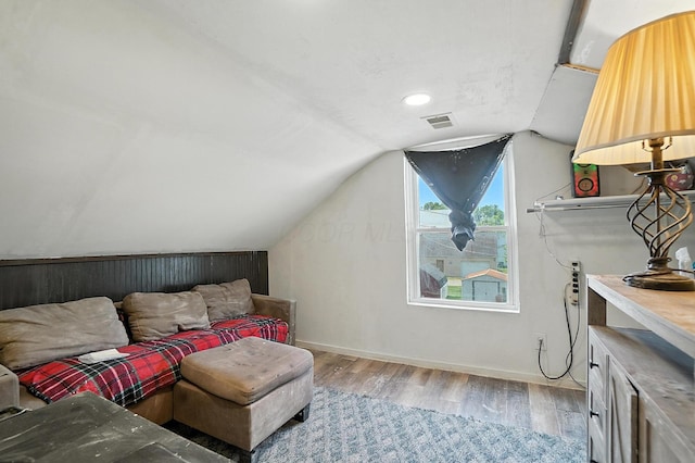 1106 E Walnut St, Lancaster, OH 43130 - bedroom with lofted ceiling and wood finished floors