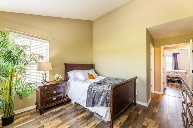 183 W Case St, Powell, OH 43065 - bedroom with dark wood-style flooring and baseboards