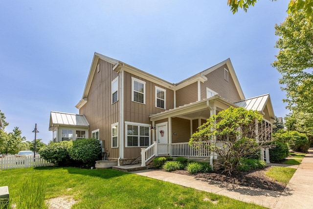 183 W Case St, Powell, OH 43065 - view of front of home with covered porch, a standing seam roof, and metal roof