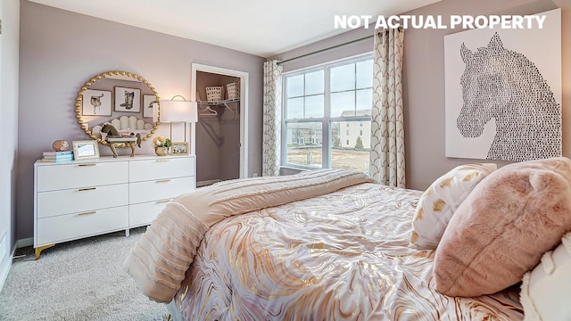 904 Allegro Dr, Reynoldsburg, OH 43068 - carpeted bedroom with a walk in closet and a closet
