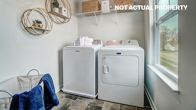 904 Allegro Dr, Reynoldsburg, OH 43068 - laundry area featuring washer and dryer and baseboards