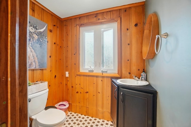 4 Greer St, Mount Vernon, OH 43050 - bathroom with vanity, wood walls, and toilet