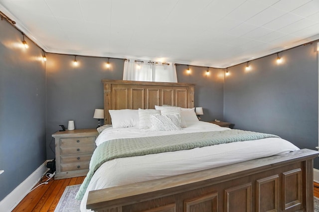 4 Greer St, Mount Vernon, OH 43050 - bedroom with hardwood / wood-style floors and baseboards