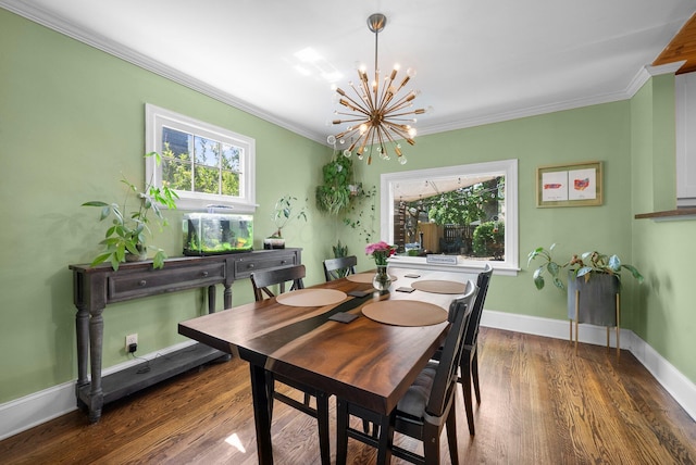472 Tibet Rd, Columbus, OH 43202 - dining space featuring a chandelier, ornamental molding, wood finished floors, and baseboards