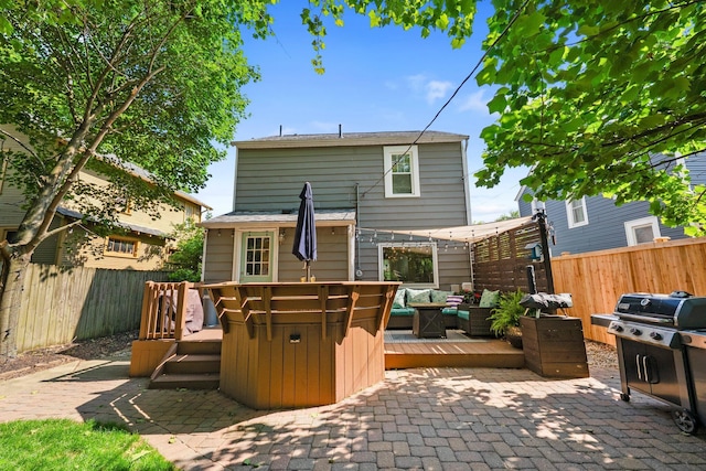 472 Tibet Rd, Columbus, OH 43202 - rear view of house with a deck, an outdoor hangout area, and a fenced backyard
