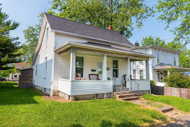 77 W High St, Mount Gilead, OH 43338 - view of front of house featuring a porch and a shingled roof