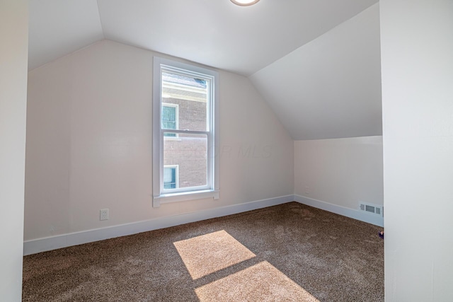 77 W High St, Mount Gilead, OH 43338 - additional living space featuring lofted ceiling, carpet floors, and baseboards