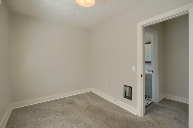 909-915 Wilson Ave, Columbus, OH 43206 - spare room featuring carpet flooring and baseboards