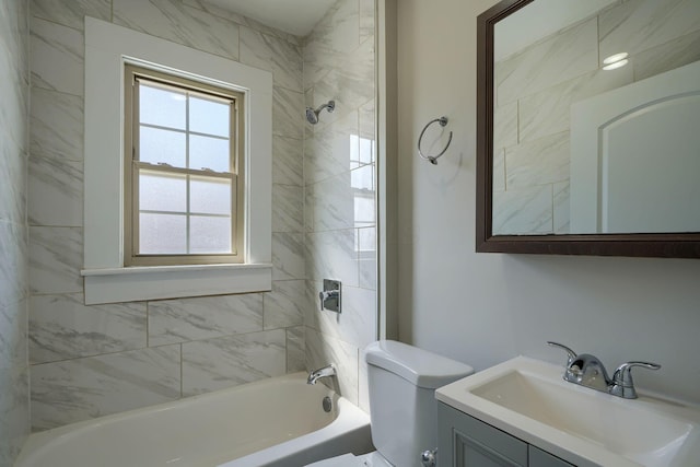 909-915 Wilson Ave, Columbus, OH 43206 - bathroom featuring vanity, bathtub / shower combination, and toilet