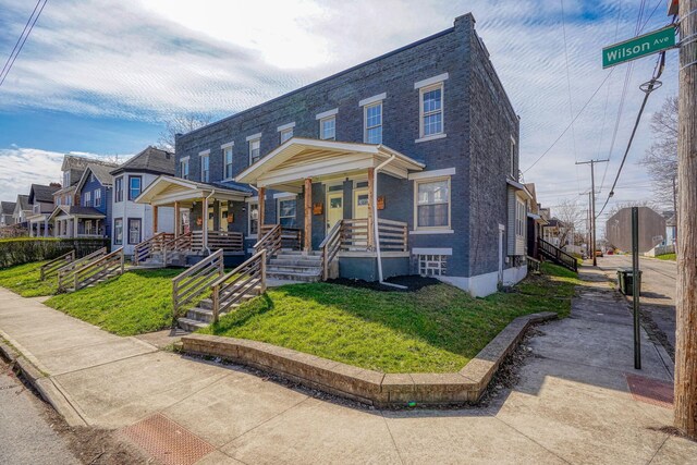 909-915 Wilson Ave, Columbus, OH 43206 - multi unit property with covered porch and a front yard