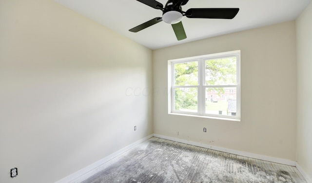 1292-1298 E 17th Ave, Columbus, OH 43211 - unfurnished room featuring baseboards, a ceiling fan, and wood finished floors