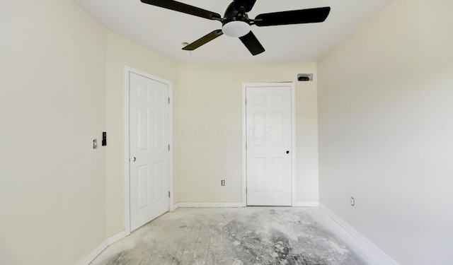1292-1298 E 17th Ave, Columbus, OH 43211 - unfurnished bedroom with baseboards and a ceiling fan